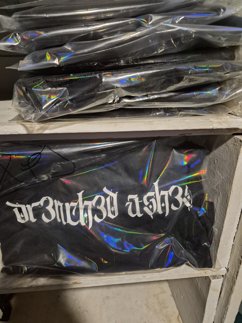 Black "Dr3nch3d Ash3s" Graphic Tee with White Gothic Script
